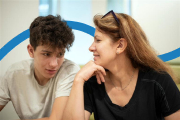 A foster carer talking a teenage boy with a blue line flowing behind them.