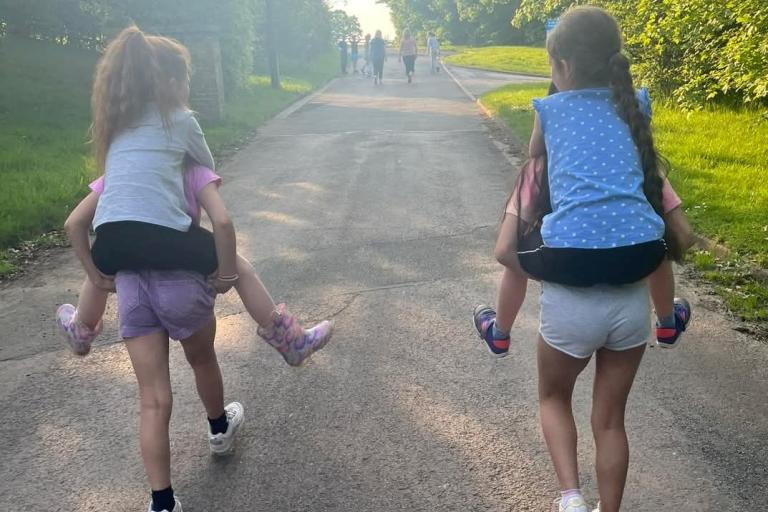 Children giving a piggyback.