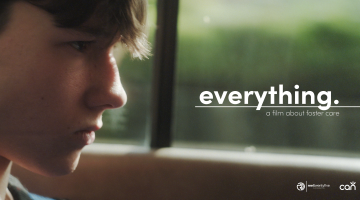 Side profile of a teenage boys face by a window with the text "everything, a film about foster care"