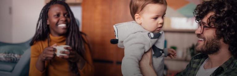 Two foster carers with a child